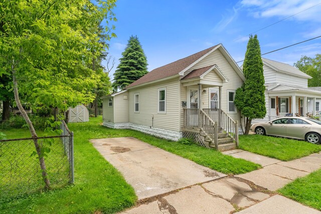 1114 Church St, Port Huron, MI 48060 - view of front of property with an outdoor structure