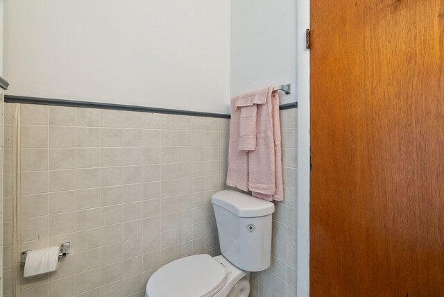 1114 Church St, Port Huron, MI 48060 - bathroom featuring tile walls and toilet
