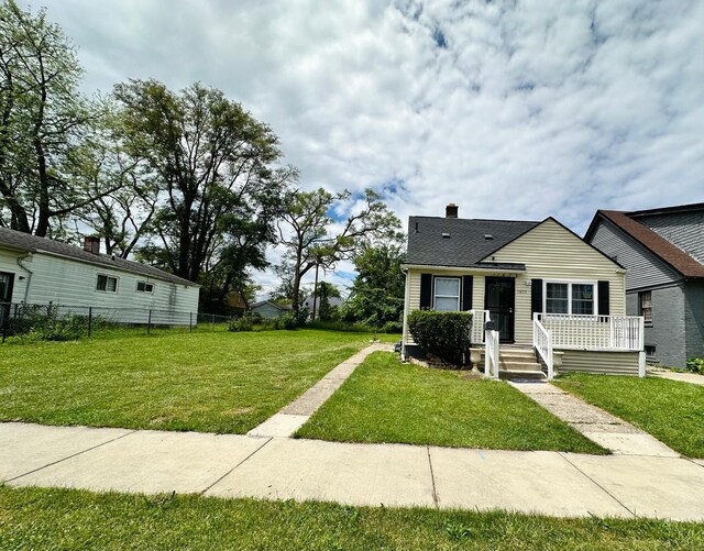 11675 Forrer St, Detroit, MI 48227 - view of front of house with a chimney