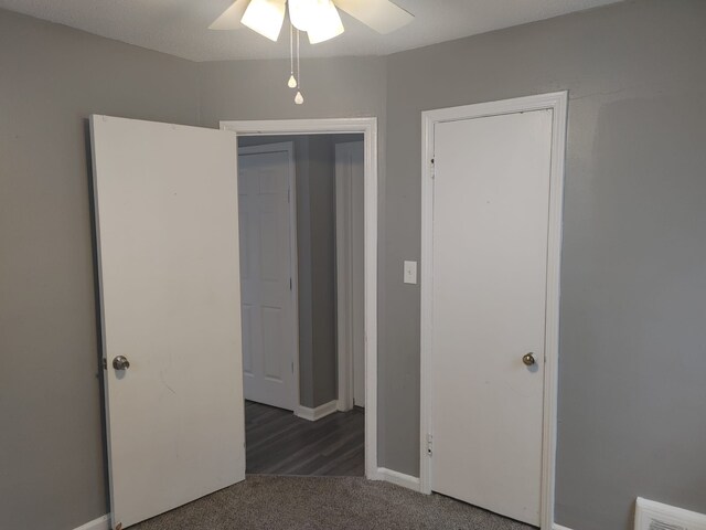 11675 Forrer St, Detroit, MI 48227 - unfurnished bedroom featuring carpet flooring, baseboards, and a ceiling fan