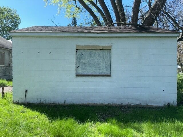 18659 Shaftsbury Ave, Detroit, MI 48219 - view of home's exterior featuring concrete block siding