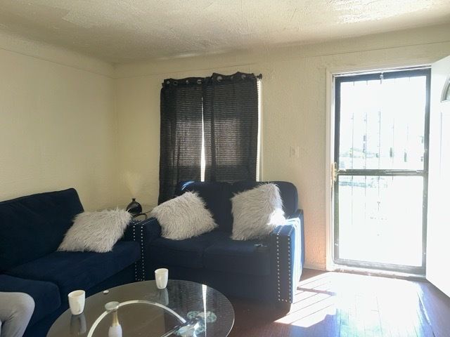 18659 Shaftsbury Ave, Detroit, MI 48219 - living room featuring wood finished floors