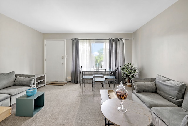 living room featuring carpet and a baseboard radiator