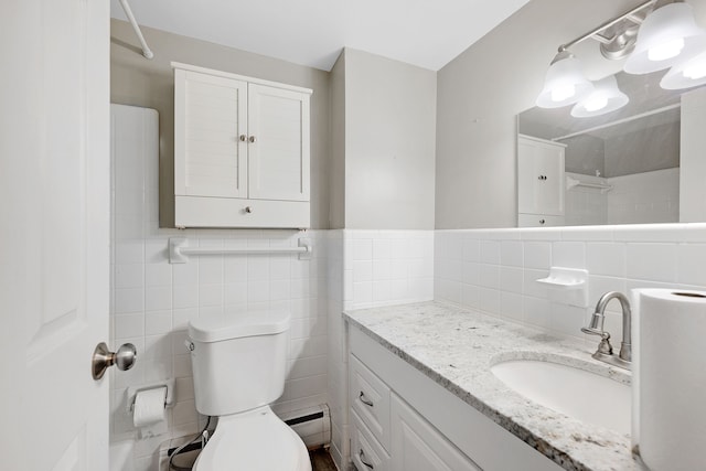 bathroom with walk in shower, vanity, toilet, and tile walls