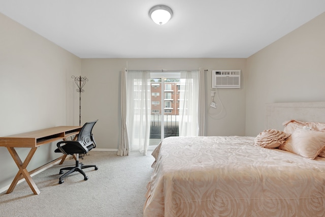 bedroom with carpet flooring, access to exterior, and a wall mounted AC