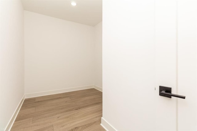 spare room featuring hardwood / wood-style floors