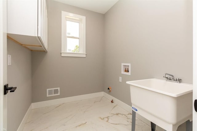 clothes washing area featuring hookup for a gas dryer, cabinets, sink, and hookup for a washing machine