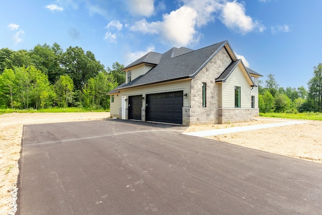 view of property exterior featuring a garage