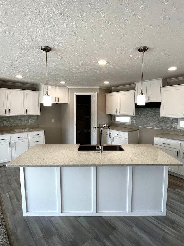2759 Naples Ct, Lapeer, MI 48446 - kitchen with a sink, white cabinetry, tasteful backsplash, recessed lighting, and a textured ceiling