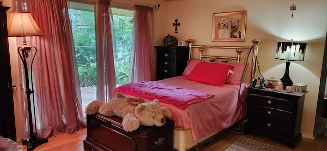 227 Joliet Ave, Houghton Lake, MI 48629 - bedroom with wood finished floors