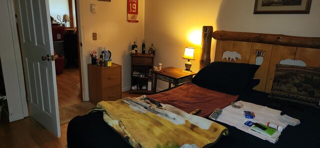 227 Joliet Ave, Houghton Lake, MI 48629 - bedroom with wood finished floors