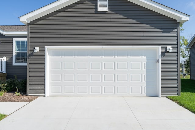 2769 Naples Ct, Lapeer, MI 48446 - garage featuring driveway