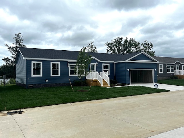 single story home with a front lawn and a garage