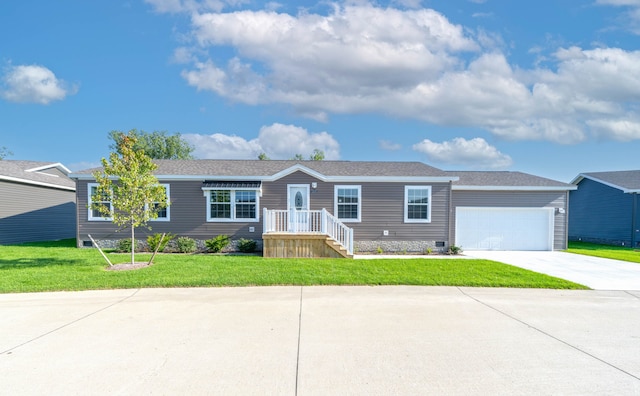 ranch-style home featuring a front yard and a garage