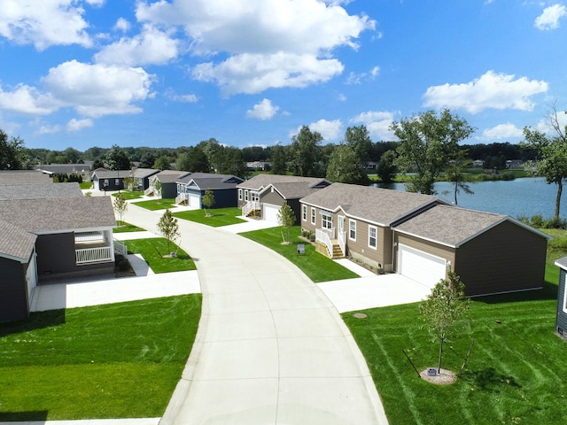 exterior space featuring a water view and a front lawn