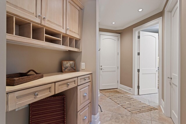 7545 Oyster Bay Dr Unit 4, Charlevoix, MI 49720 - laundry room with crown molding, recessed lighting, and baseboards