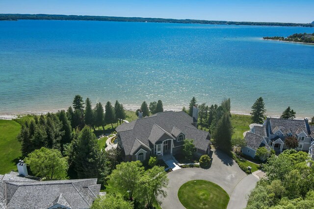 7545 Oyster Bay Dr Unit 4, Charlevoix, MI 49720 - aerial view of property and surrounding area featuring a nearby body of water