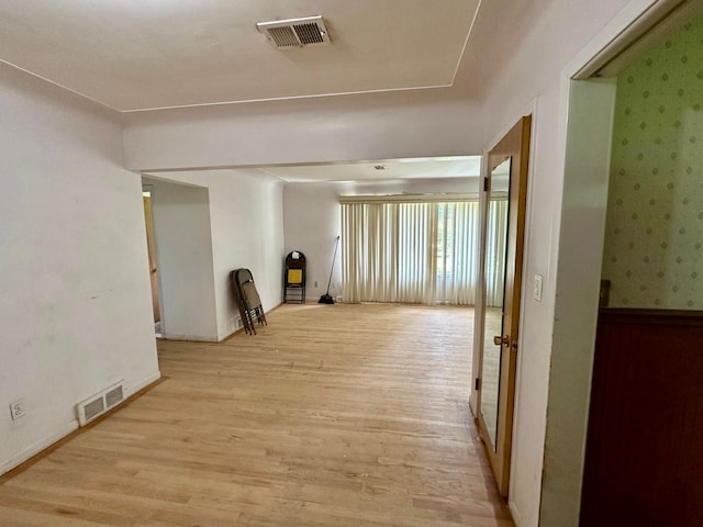 hall featuring light wood-type flooring