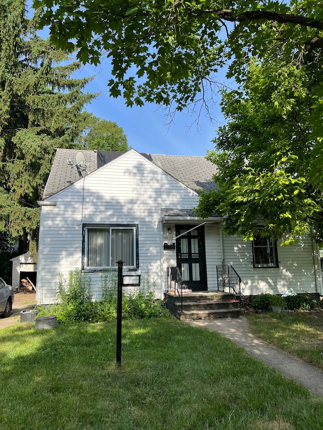 exterior space with a front yard