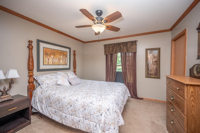 carpeted bedroom with ceiling fan and crown molding