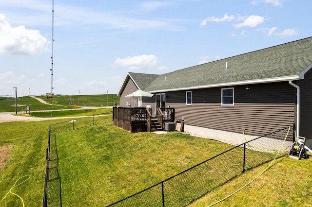 view of yard with a wooden deck