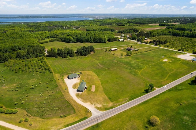 drone / aerial view with a rural view and a water view