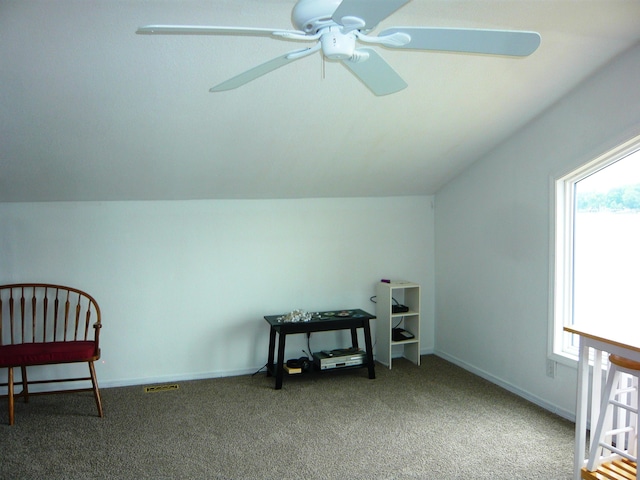 additional living space featuring carpet flooring, ceiling fan, and lofted ceiling