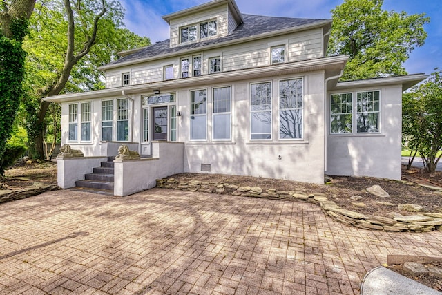 view of front facade featuring a patio area