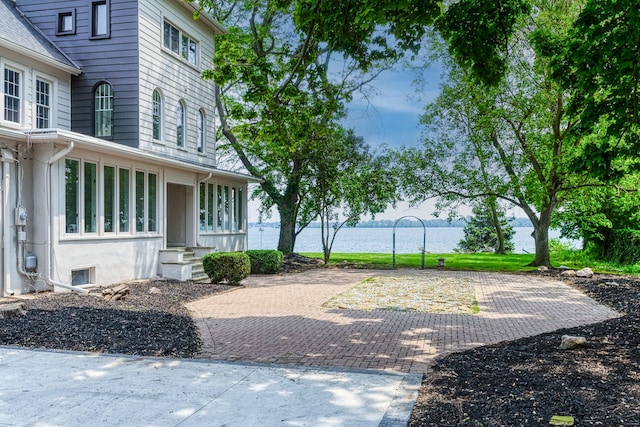 view of yard with a water view