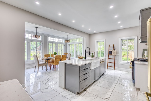 kitchen featuring gray cabinetry, dishwasher, sink, hanging light fixtures, and white range with gas stovetop