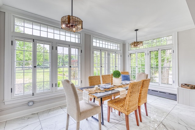 sunroom featuring a notable chandelier, baseboard heating, and french doors