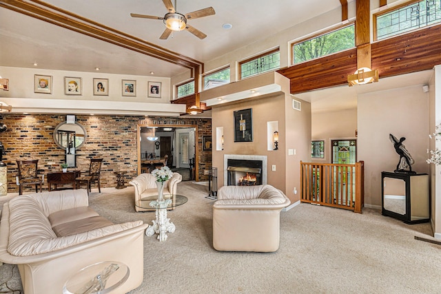 6888 Ann Arbor Rd, Jackson, MI 49201 - living room featuring ceiling fan, carpet flooring, healthy amount of natural light, a towering ceiling, and baseboards