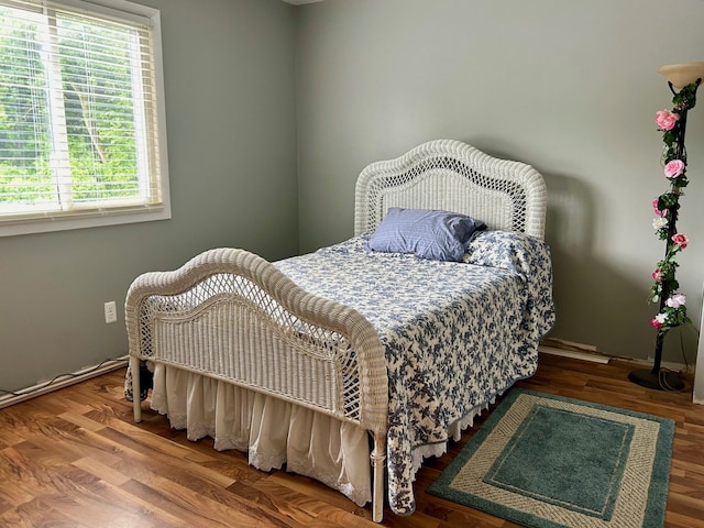 bedroom featuring hardwood / wood-style floors