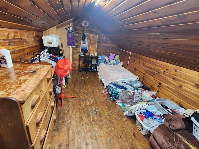 bonus room featuring wood walls, lofted ceiling, and dark wood-type flooring