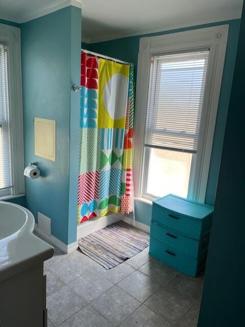423 Oak St, Paw Paw, MI 49079 - bathroom featuring vanity, baseboards, a shower with shower curtain, and tile patterned floors