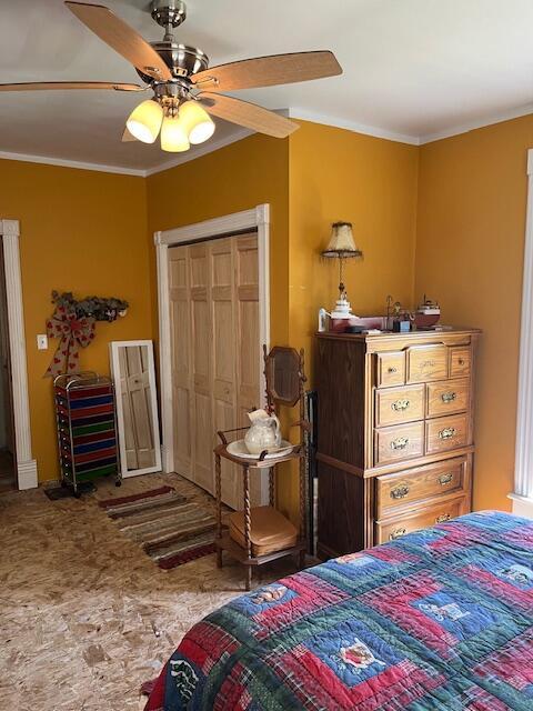 423 Oak St, Paw Paw, MI 49079 - bedroom with crown molding and a ceiling fan