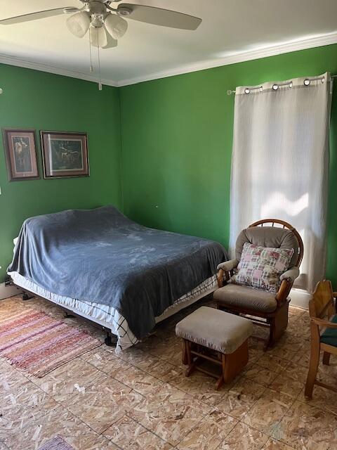 423 Oak St, Paw Paw, MI 49079 - bedroom featuring crown molding and ceiling fan