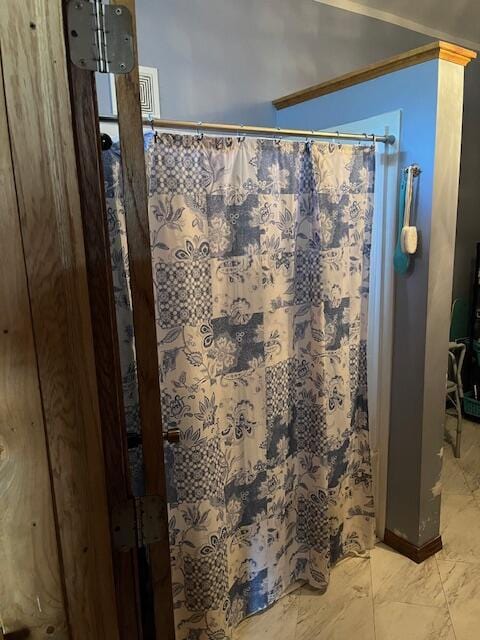 423 Oak St, Paw Paw, MI 49079 - bathroom with curtained shower and marble finish floors