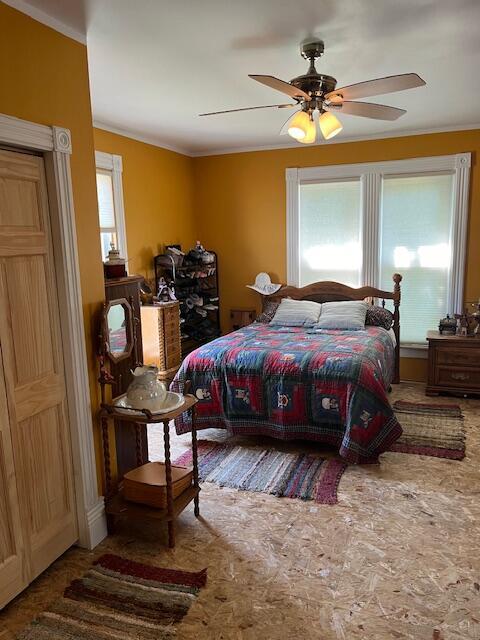 423 Oak St, Paw Paw, MI 49079 - bedroom with crown molding and ceiling fan