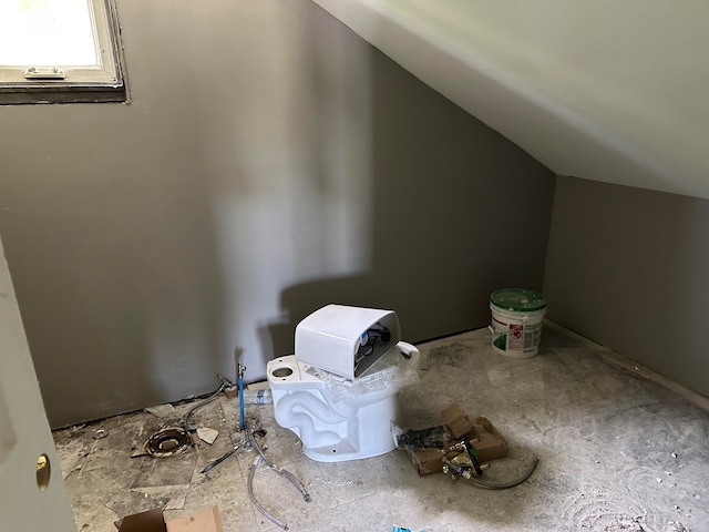 bonus room featuring vaulted ceiling