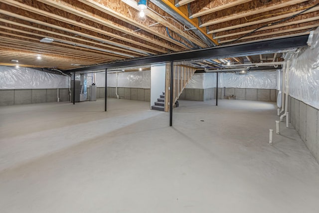 basement with heating unit and water heater