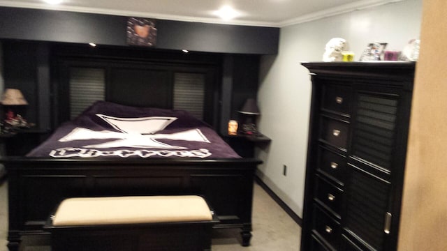 bedroom featuring crown molding and light carpet