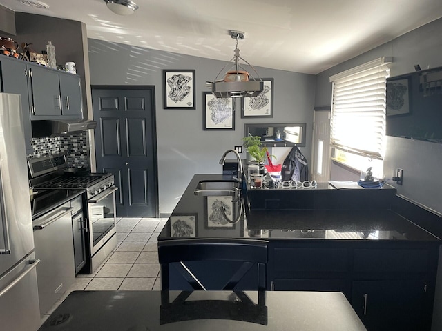 kitchen featuring appliances with stainless steel finishes, extractor fan, vaulted ceiling, sink, and light tile patterned floors