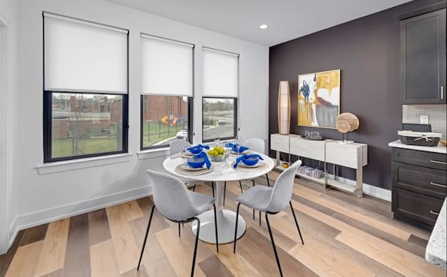 dining room with light wood-type flooring