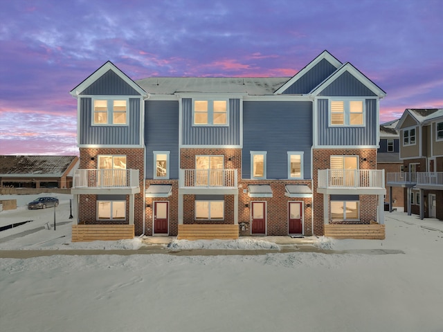 multi unit property featuring brick siding