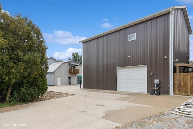 view of side of property featuring a garage