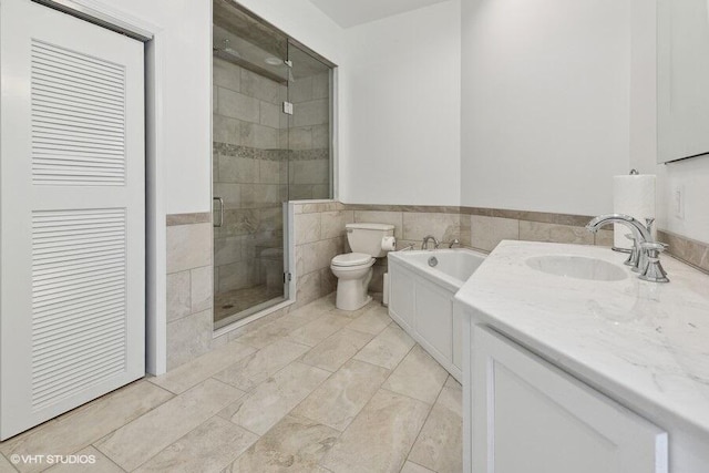 full bathroom featuring vanity, toilet, tile walls, and plus walk in shower