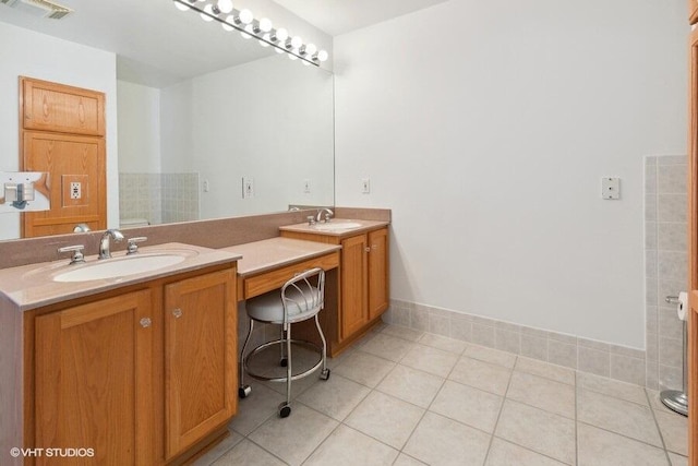 bathroom featuring tile patterned floors and vanity