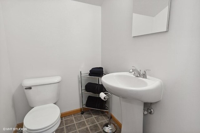 bathroom featuring toilet