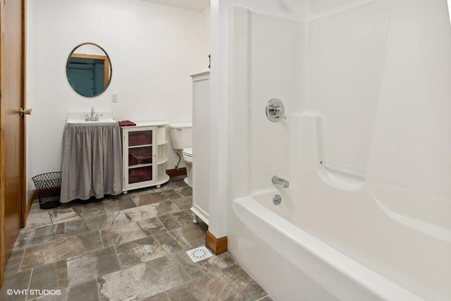 full bathroom with vanity, shower / bathtub combination, and toilet